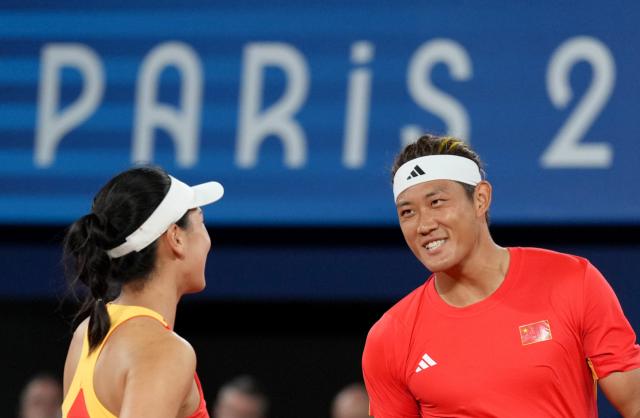 足球-张之臻：“等张奥运长大了，我会告诉她……”